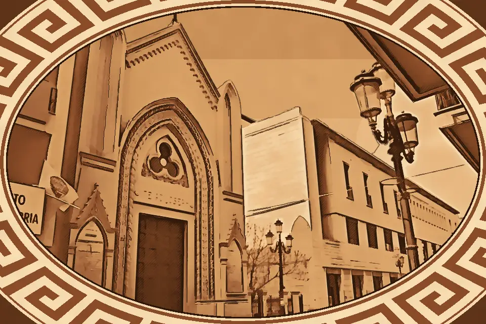 Exterior view of the Church of San Giuseppe al Corso in Reggio Calabria, featuring its Gothic-style façade and central rose window.