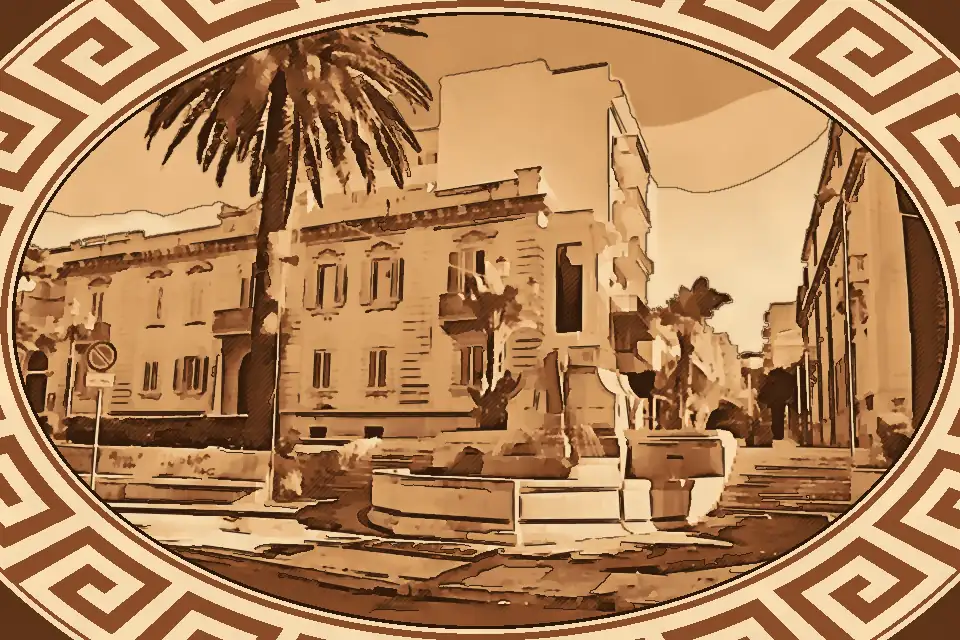 Monumental Fountain La Luminosa in Reggio Calabria with central Ionic column, cascading water features, and black and white mosaic base along the seafront promenade.