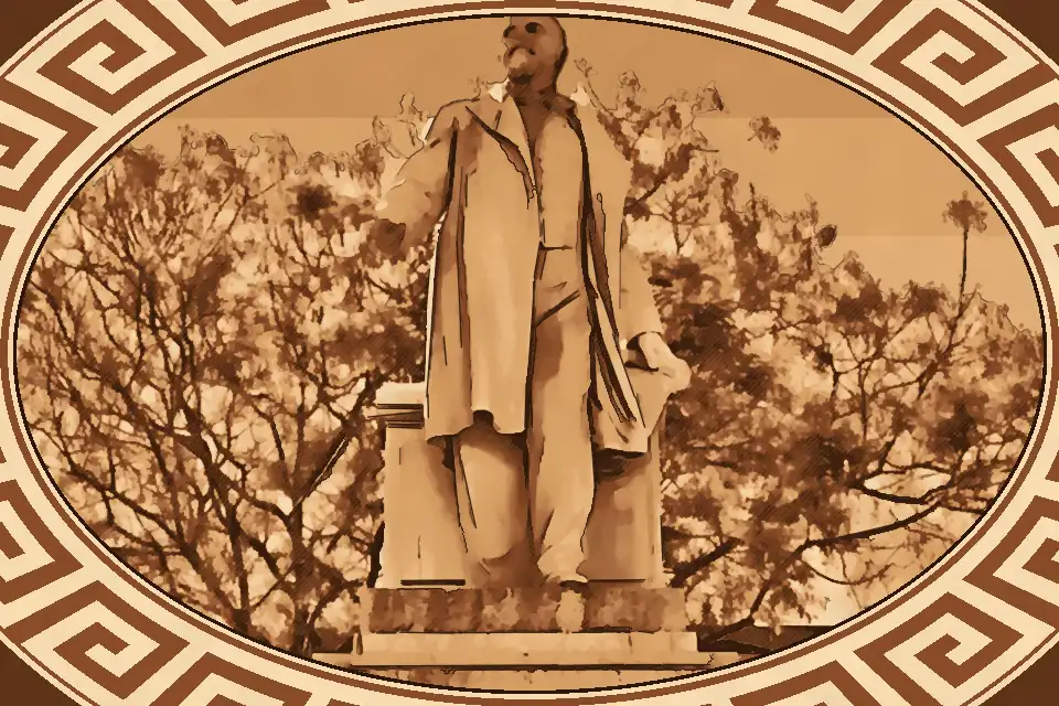 Marble statue of Giuseppe De Nava with relief carvings and twin fountains in Piazza De Nava, Reggio Calabria.