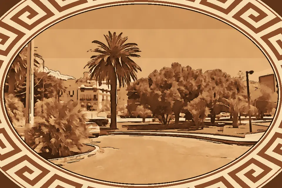 Piazza Indipendenza Reggio Calabria with palm trees, coastal road and Mount Etna visible across the Strait of Messina