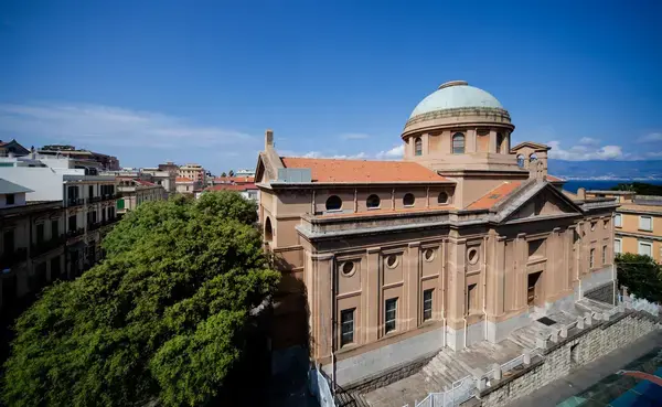 Exterior view of the Church of San Giorgio al Corso with its historic stone façade along Corso Garibaldi, Reggio Calabria. The Church of San Giorgio al Corso’s façade facing Corso Garibaldi, showcasing its historic architecture and central location in Reggio Calabria.