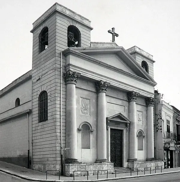 Neoclassical façade of the Cattolica dei Greci in Reggio Calabria with bronze-gilt portal and Greek inscription.