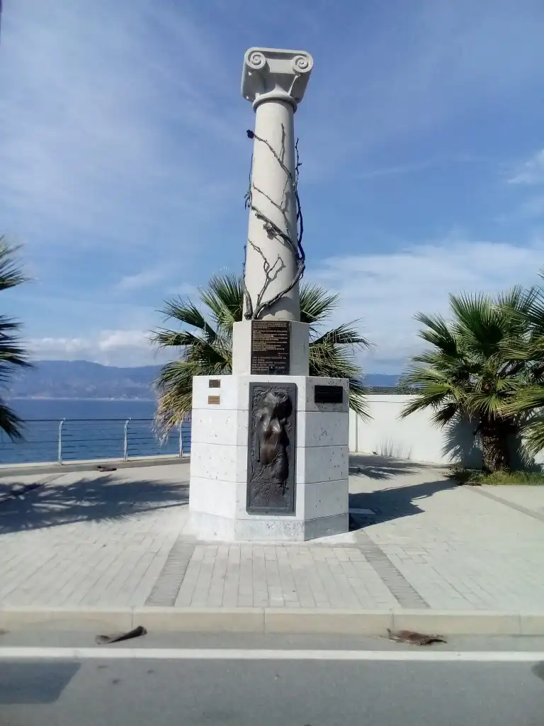 The Omonoia monument by Giuseppe Gattuso overlooking the Strait of Messina at Parco Lineare Sud in Reggio Calabria.